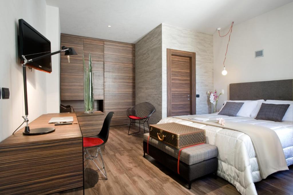 Двухместный (Улучшенный двухместный номер с 1 кроватью или 2 отдельными кроватями) отеля Hotel Unicorno, Флоренция
