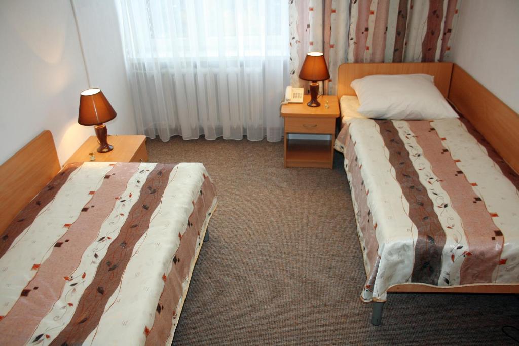 Двухместный (Двухместный номер с 2 отдельными кроватями) отеля Hotel Logos, Сувалки
