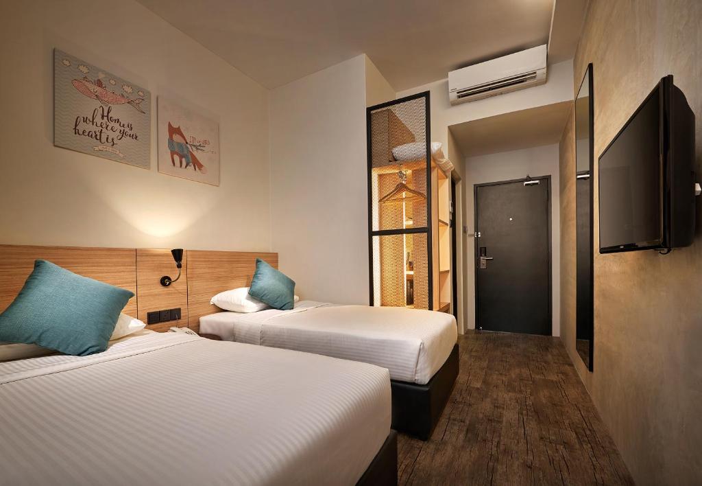 Двухместный (Стандартный двухместный номер с 2 отдельными кроватями) отеля U Hotel Penang, Пенанг