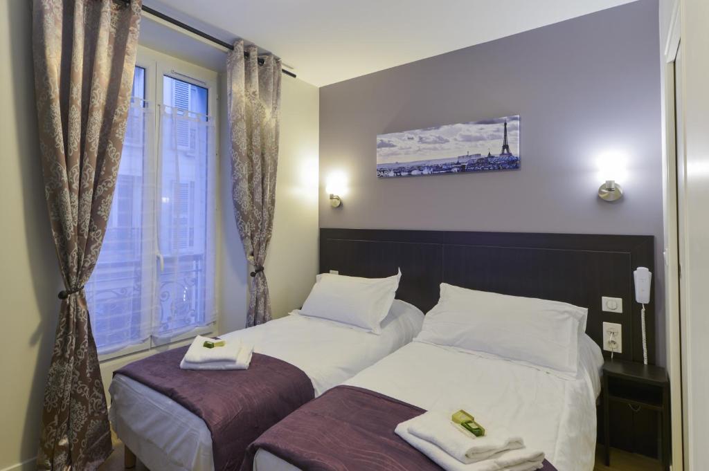 Двухместный (Двухместный номер с 2 отдельными кроватями) отеля Hôtel du Quai de Seine, Париж