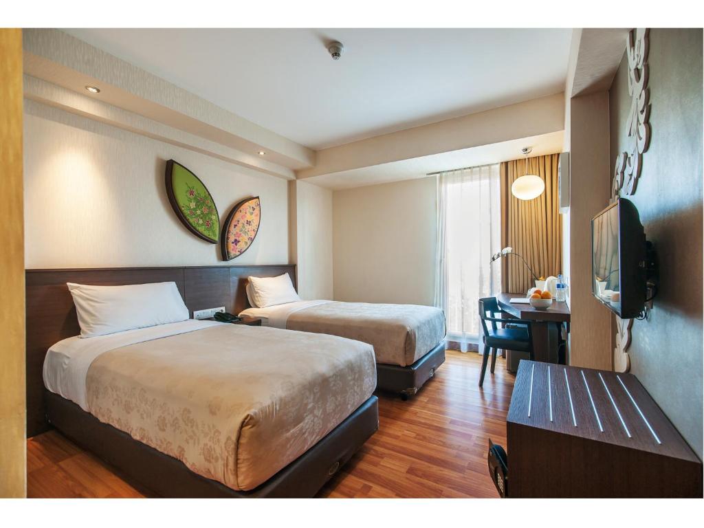 Двухместный (Смежные двухместный номер Делюкс с 1 кроватью и двухместный номер с 2 отдельными кроватями) отеля Atanaya Kuta Bali, Кута