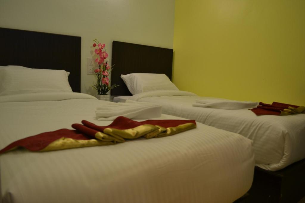 Двухместный (Улучшенный двухместный номер с 1 кроватью или 2 отдельными кроватями) отеля DR Hotel Penang, Пенанг