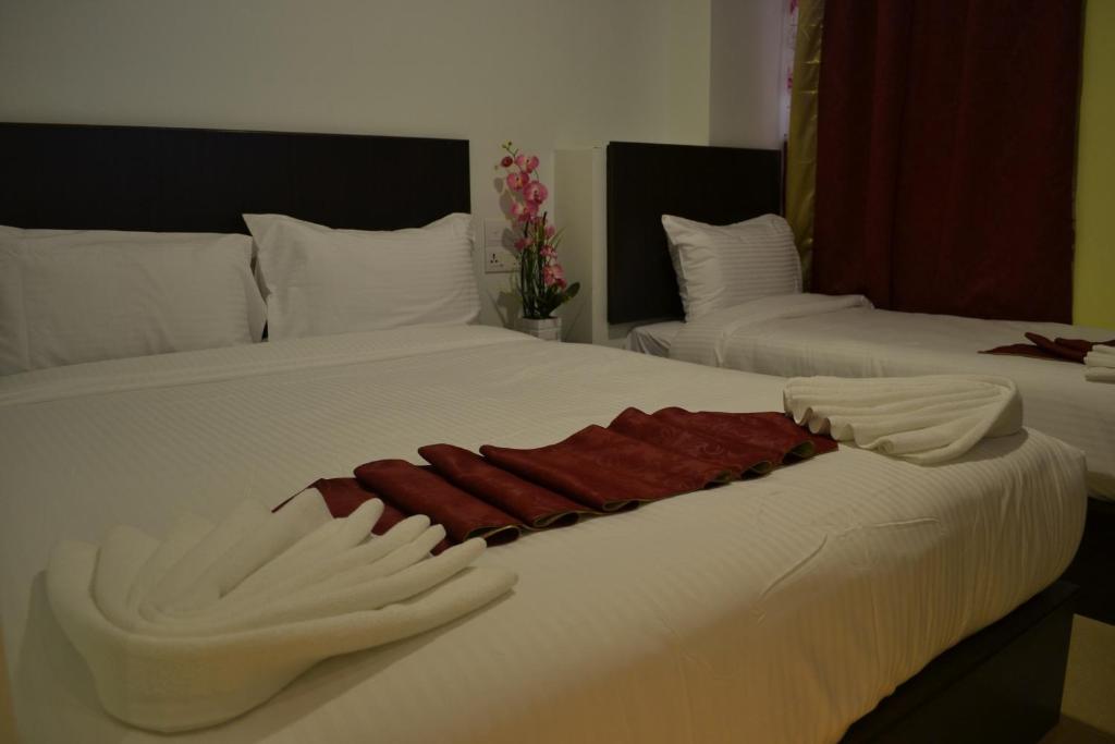 Трехместный (Трехместный номер Делюкс) отеля DR Hotel Penang, Пенанг