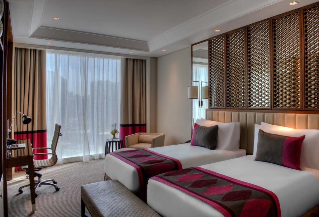 Двухместный (Роскошный двухместный номер с 2 отдельными кроватями и видом на город) отеля Taj Dubai, Дубай