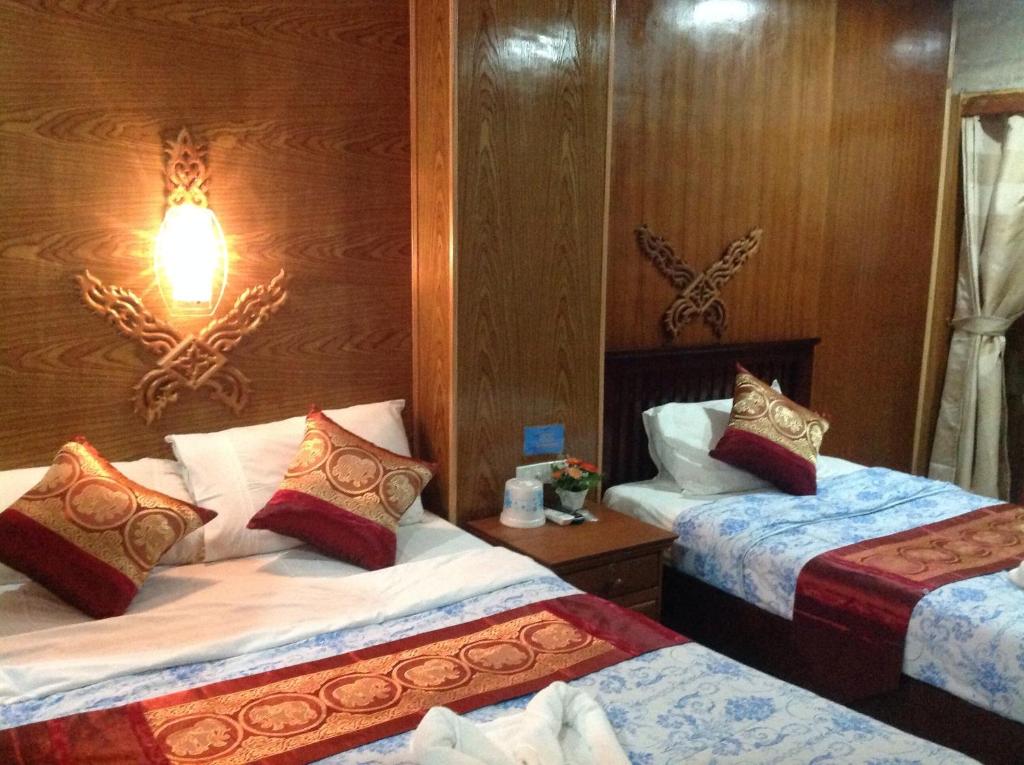 Двухместный (Стандартный двухместный номер с 1 кроватью или 2 отдельными кроватями и видом на сад) курортного отеля Ruan Mai Naiyang Beach Resort, Пхукет