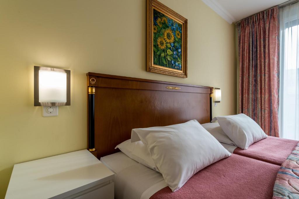Двухместный (Двухместный номер с 2 отдельными кроватями) отеля Hotel Churchill, Женева
