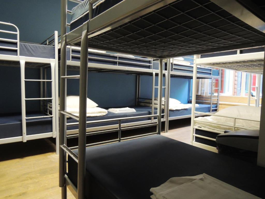 Номер (Односпальная кровать в общем номере с 12 кроватями) хостела 3BE Backpackers Bed & Breakfast Eindhoven, Эйндховен