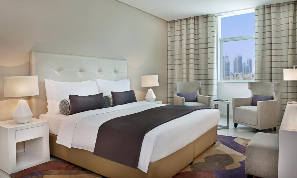 Сьюит (Люкс с 3 спальнями и видом на центр города) апарт-отеля DAMAC Maison Cour Jardin, Дубай