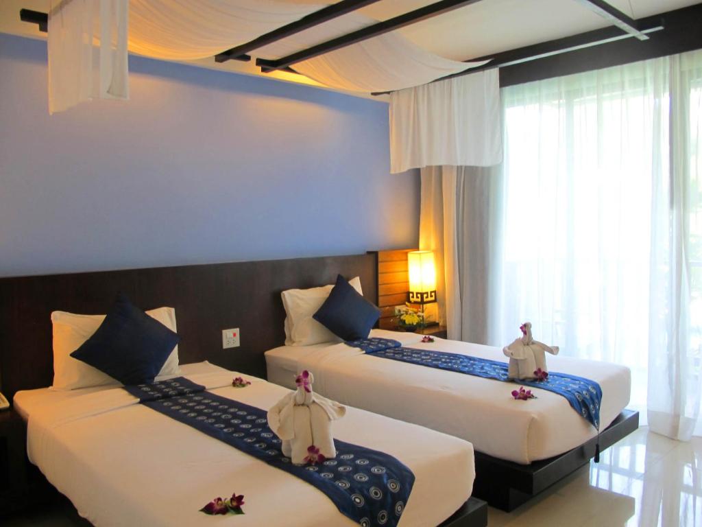 Двухместный (Улучшенный двухместный номер с 1 кроватью или 2 отдельными кроватями) отеля Apasari Krabi, Краби