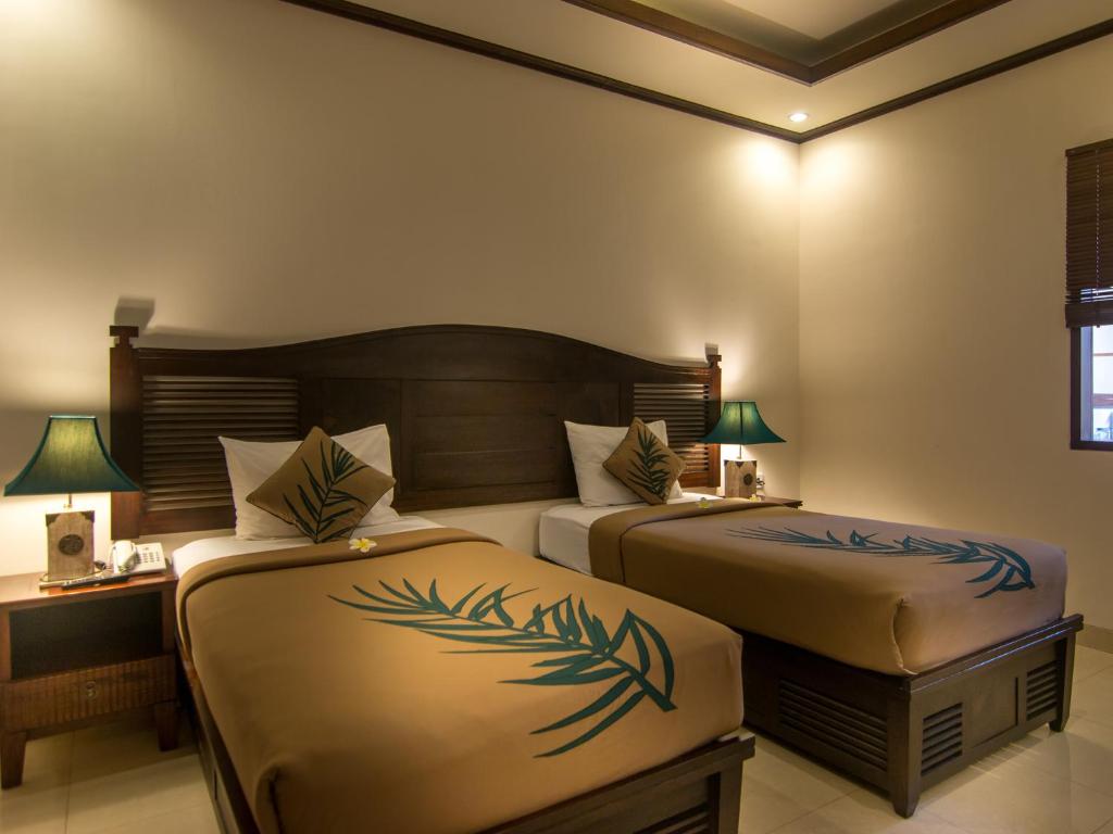 Двухместный (Двухместный номер Делюкс с 1 кроватью или 2 отдельными кроватями) курортного отеля De Munut Balinese Resort, Убуд
