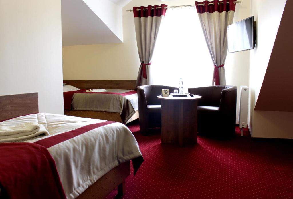 Двухместный (Двухместный номер с 2 отдельными кроватями) отеля Hotel Dukat, Бяла-Подляска
