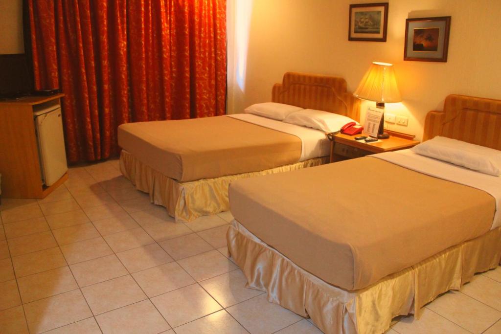 Двухместный (Двухместный номер «Премиум» с 1 кроватью или 2 отдельными кроватями) отеля Elegant Circle Inn, Себу