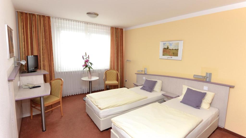 Двухместный (Двухместный номер с 1 кроватью или 2 отдельными кроватями) отеля Panorama Inn Hotel, Гамбург