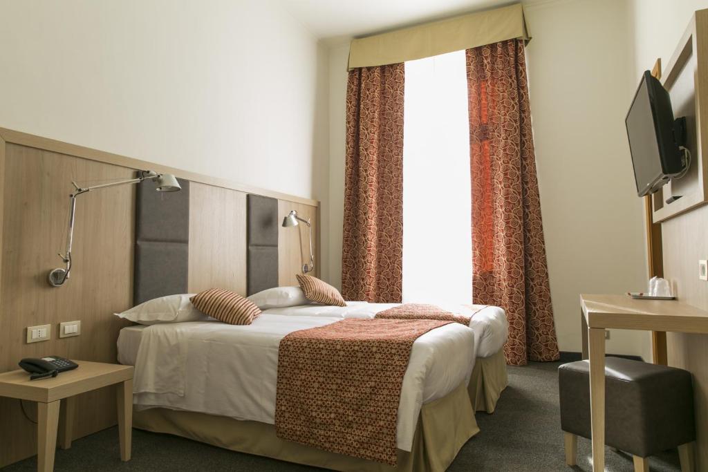 Двухместный (Двухместный номер с 1 кроватью или 2 отдельными кроватями) отеля Hotel Casa Valdese, Рим