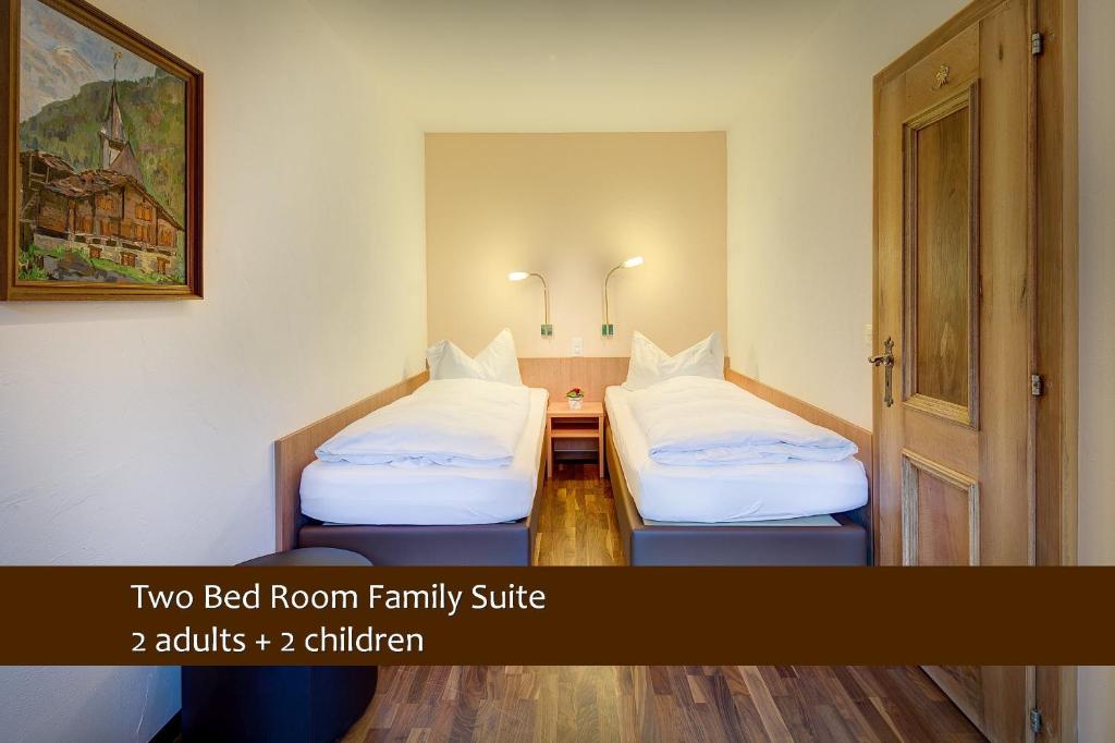 Семейный (Семейный люкс с 2 спальнями и террасой в саду) отеля Best Western Plus Alpen Resort Hotel, Церматт