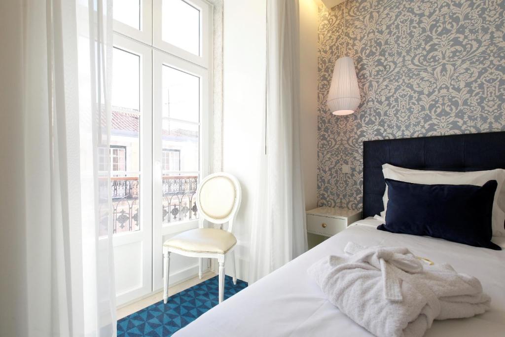 Двухместный (Двухместный номер с 1 кроватью или 2 отдельными кроватями и балконом) отеля Hotel Lis - Baixa, Лиссабон
