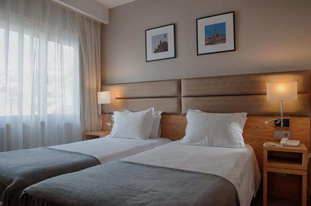 Одноместный (Двухместный номер с 1 двуспальной или 2 отдельными кроватями, одноместное размещение) отеля Hotel Oslo, Коимбра