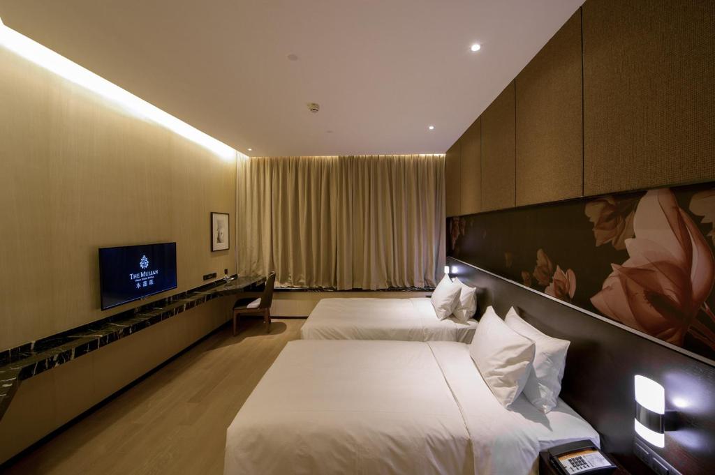 Двухместный (Представительский двухместный номер с 2 отдельными кроватями) отеля The Mulian Hotel, Гуанчжоу