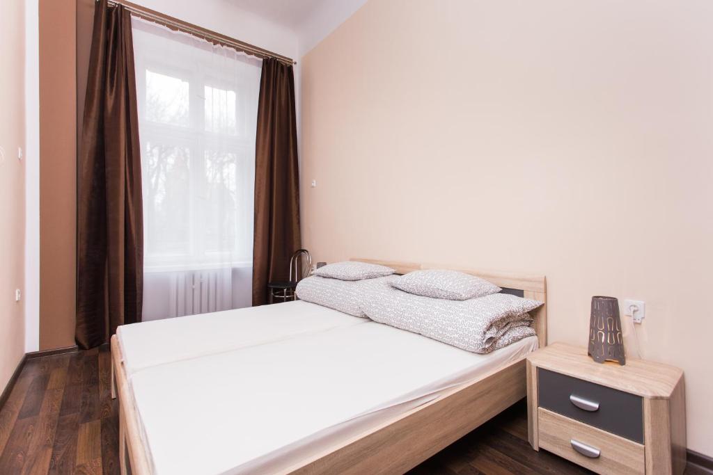 Двухместный (Двухместный номер с 2 отдельными кроватями и ванной комнатой) хостела One World Hostel, Краков