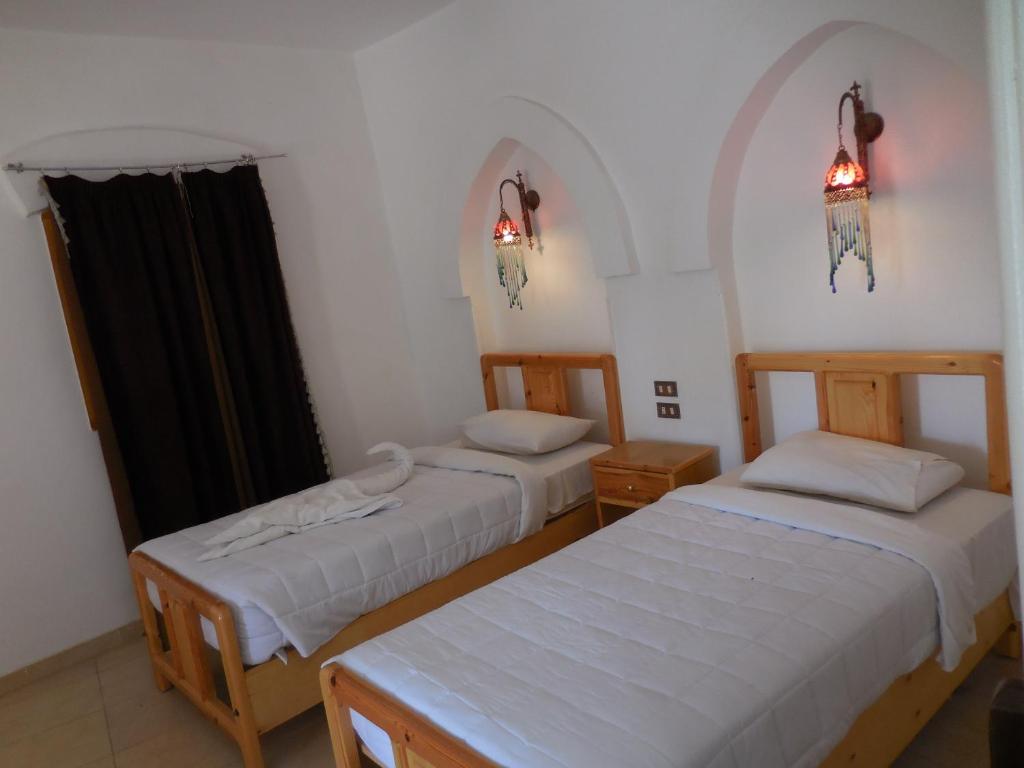 Двухместный (Двухместный номер с 1 кроватью или 2 отдельными кроватями) отеля Hotel Sheherazade, Луксор