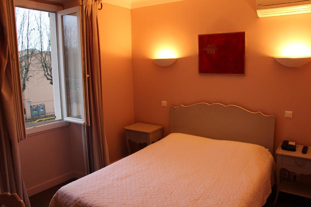 Двухместный (Классический двухместный номер с 1 кроватью) отеля Hôtel Les Palmiers, Сен-Тропе