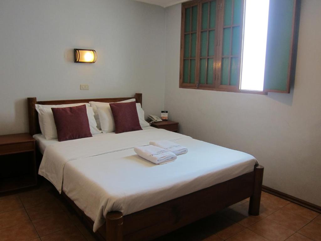 Двухместный (Двухместный номер «Премьер» с 1 кроватью или 2 отдельными кроватями) отеля Nichols Airport Hotel, Манила