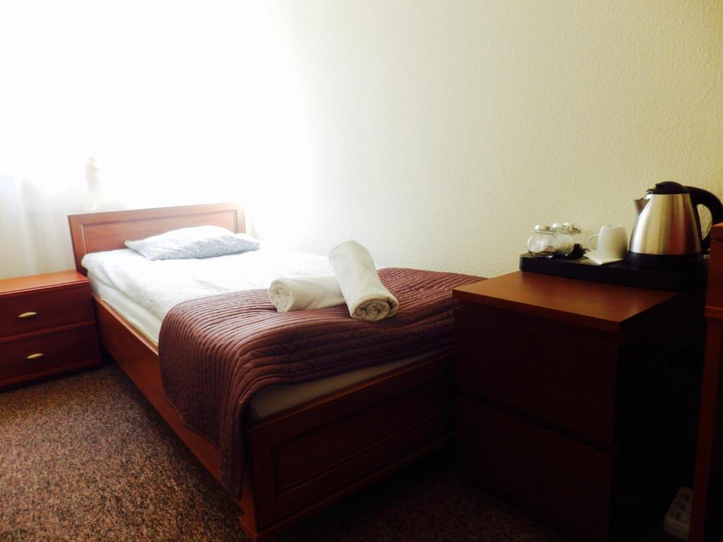 Двухместный (Двухместный номер с 2 отдельными кроватями и собственной ванной комнатой) хостела Hostel Coco, Варшава