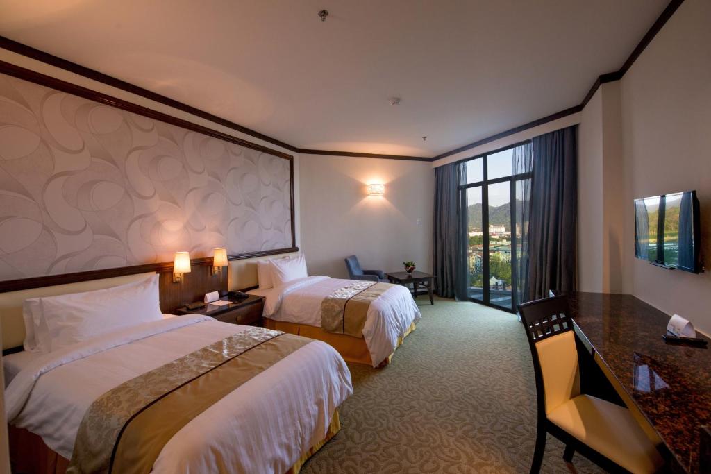 Двухместный (Двухместный номер Делюкс с 1 кроватью или 2 отдельными кроватями) отеля Adya Hotel Langkawi, Лангкави