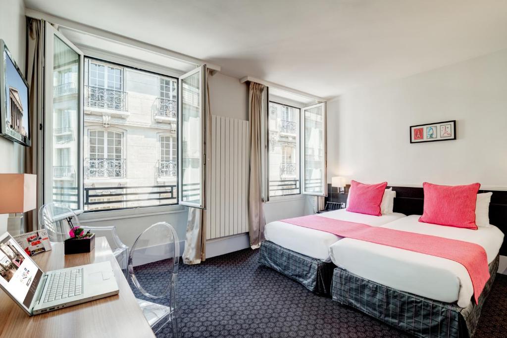 Двухместный (Улучшенный двухместный номер с 2 отдельными кроватями) отеля Hotel Caumartin Opéra - Astotel, Париж