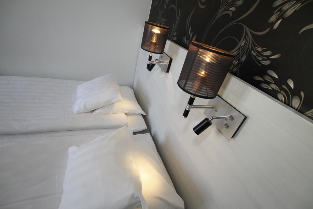 Двухместный (Стандартный двухместный номер с 2 отдельными кроватями) отеля Donners Hotell - Sweden Hotels, Висбю