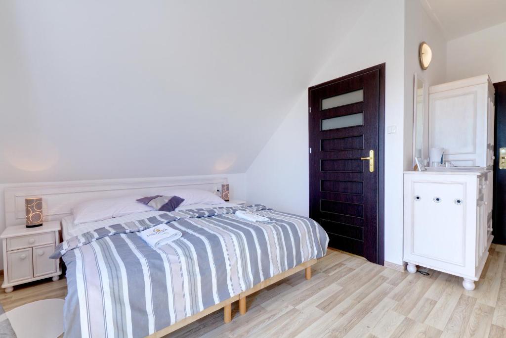 Двухместный (Двухместный номер с 2 отдельными кроватями и балконом — 3 этаж) семейного отеля Pensjonat Riwiera, Крыница-Морска