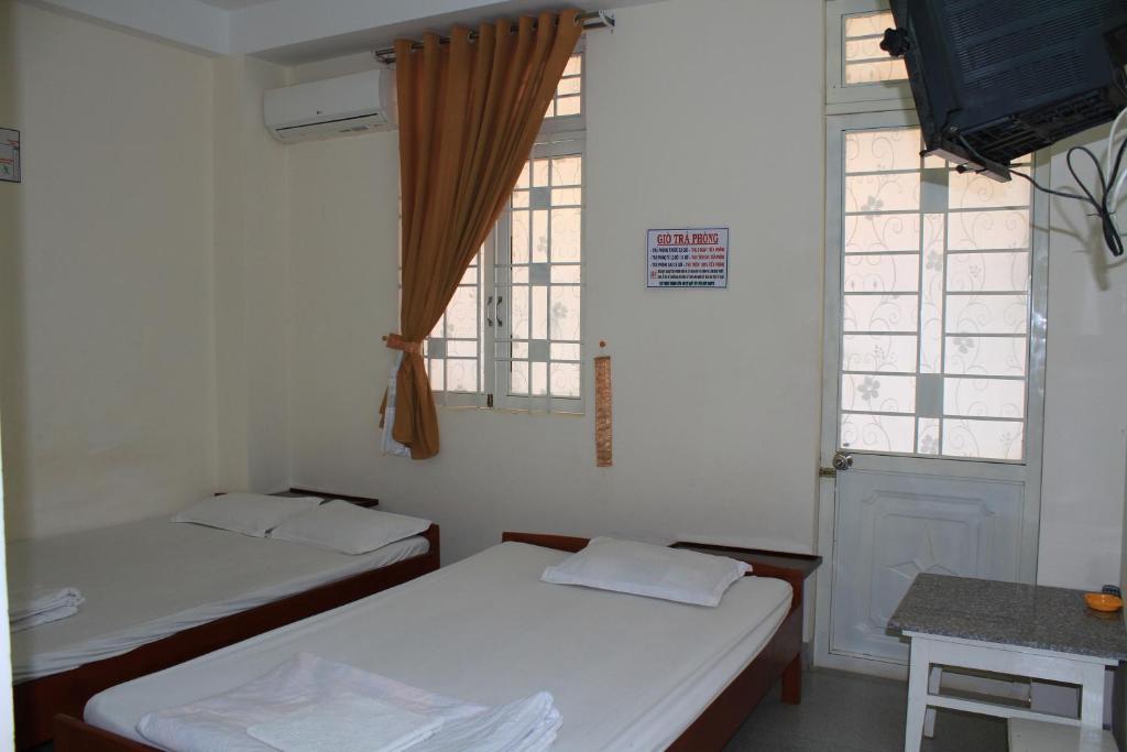 Двухместный (Бюджетный двухместный номер с 2 отдельными кроватями) гостевого дома Ngoc Mai Guesthouse, Буонметхуот