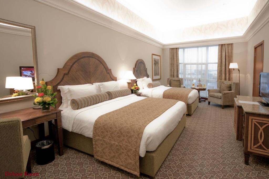 Двухместный (Семейный номер Делюкс с 2 отдельными кроватями) отеля Ayla Hotel, Аль-Айн