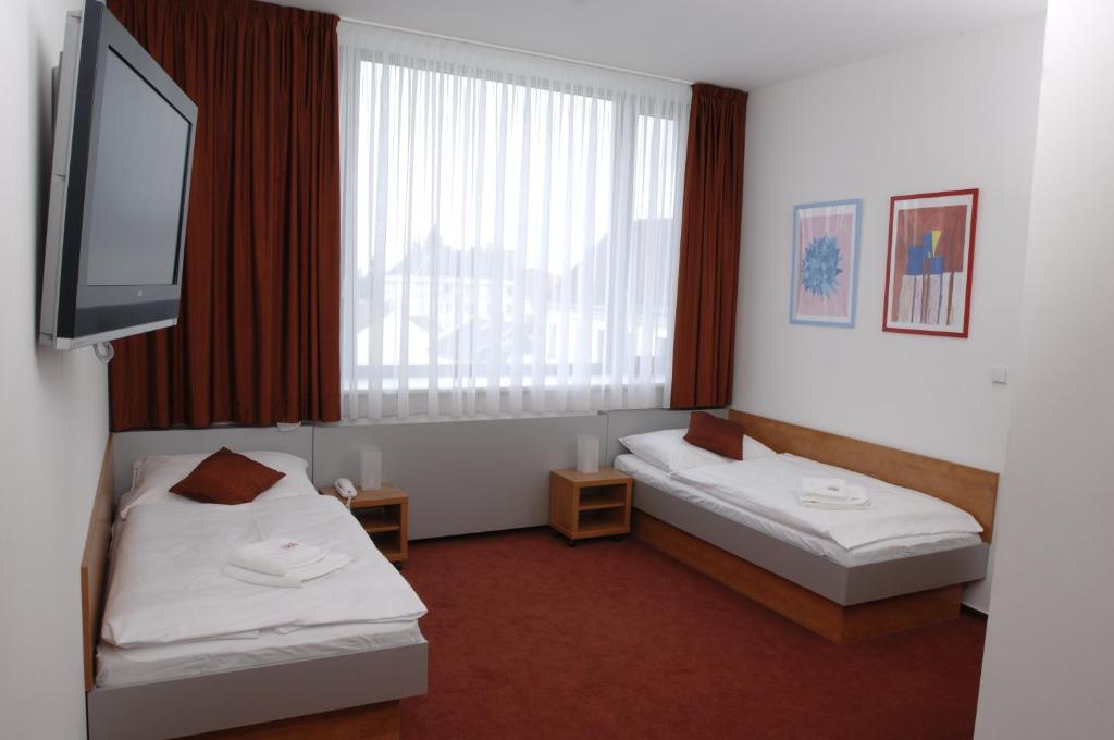 Двухместный (Стандартный двухместный номер с 2 отдельными кроватями) отеля Ruby Blue, Острава