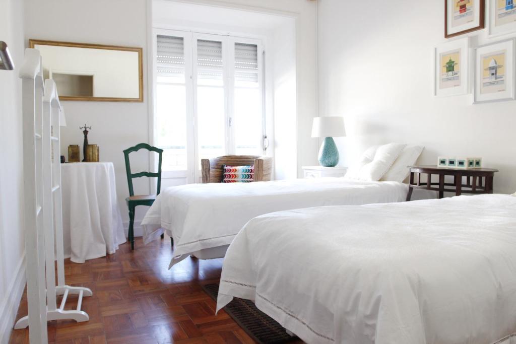 Двухместный (Двухместный номер с 2 отдельными кроватями и общей ванной комнатой) отеля Magnolia Guesthouse, Лиссабон