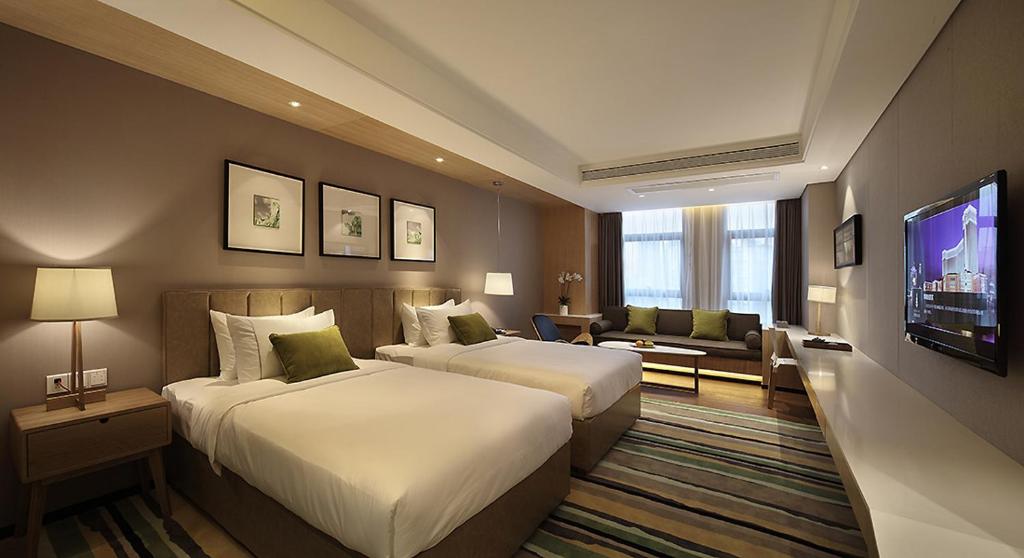 Двухместный (Двухместный номер Делюкс с 2 отдельными кроватями) отеля Baobo Boutique Hotel, Чунцин