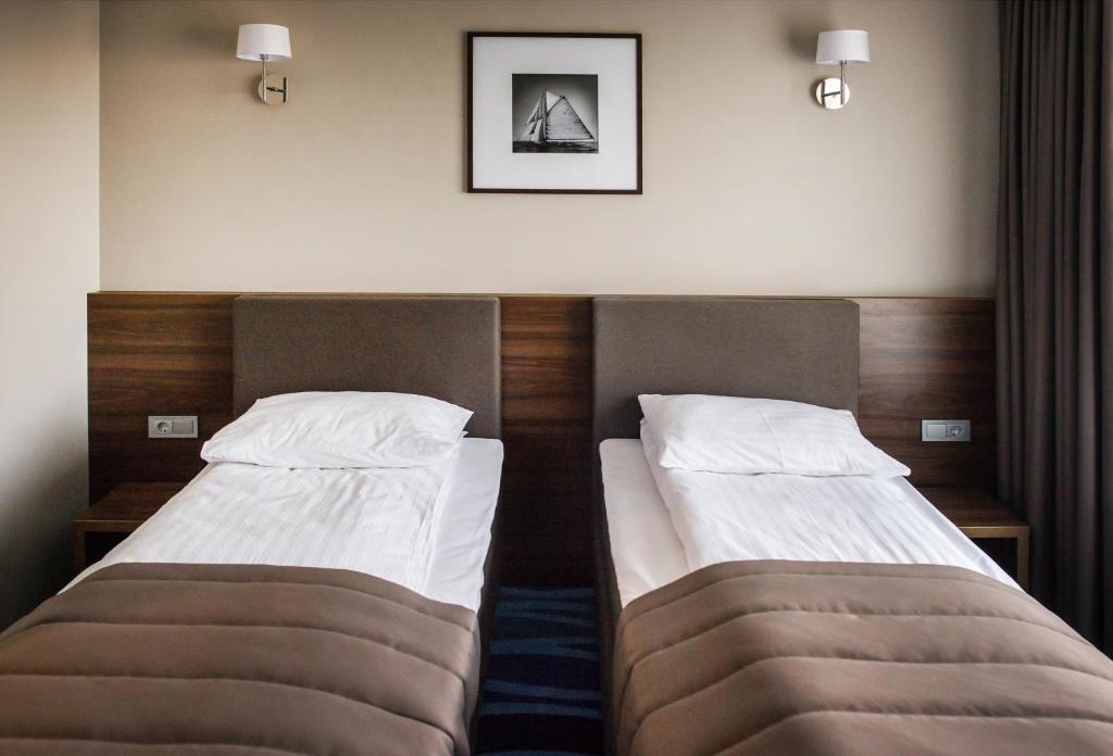 Двухместный (Стандартный двухместный номер с 2 отдельными кроватями) отеля Hotel Porto, Плунге