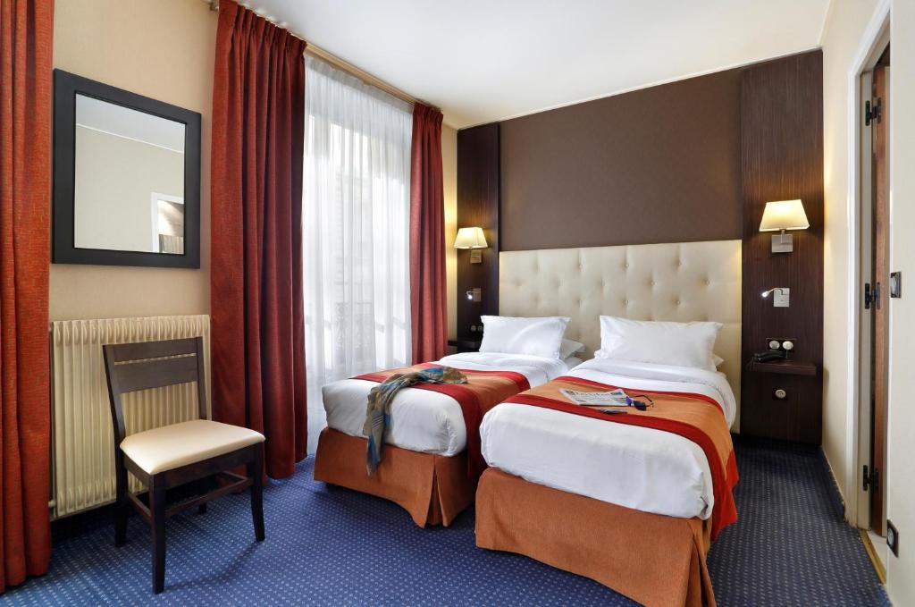 Двухместный (Двухместный номер с 2 отдельными кроватями) отеля Hotel Paix Republique, Париж