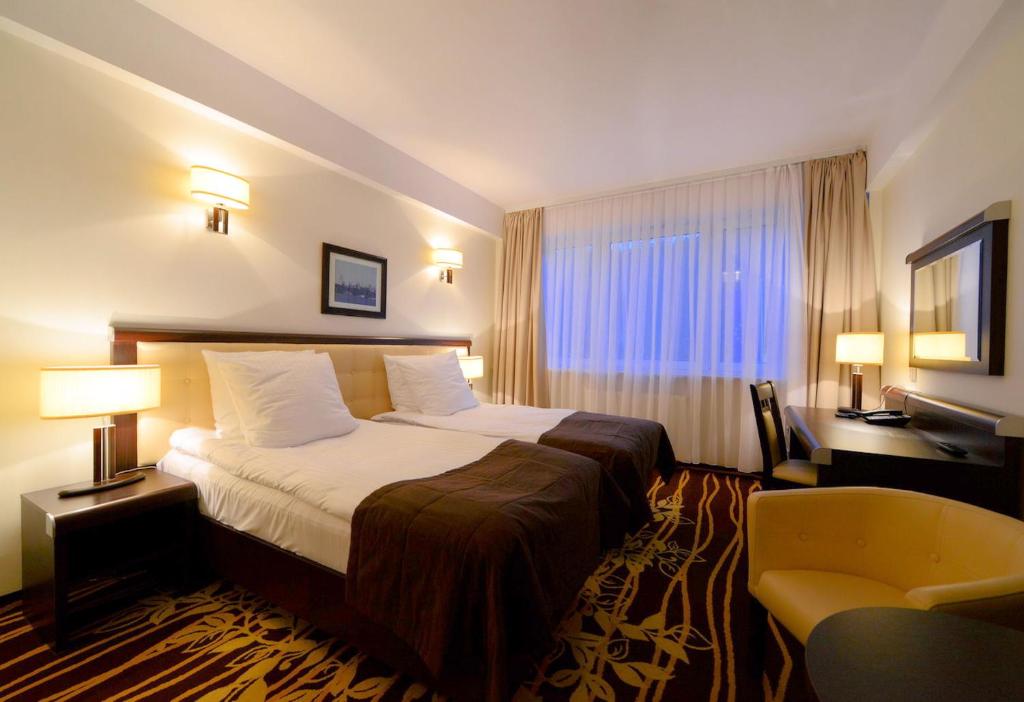 Двухместный (Стандартный двухместный номер с 1 кроватью или 2 отдельными кроватями) отеля Best Western Plus Business Faltom Hotel Gdynia, Румя