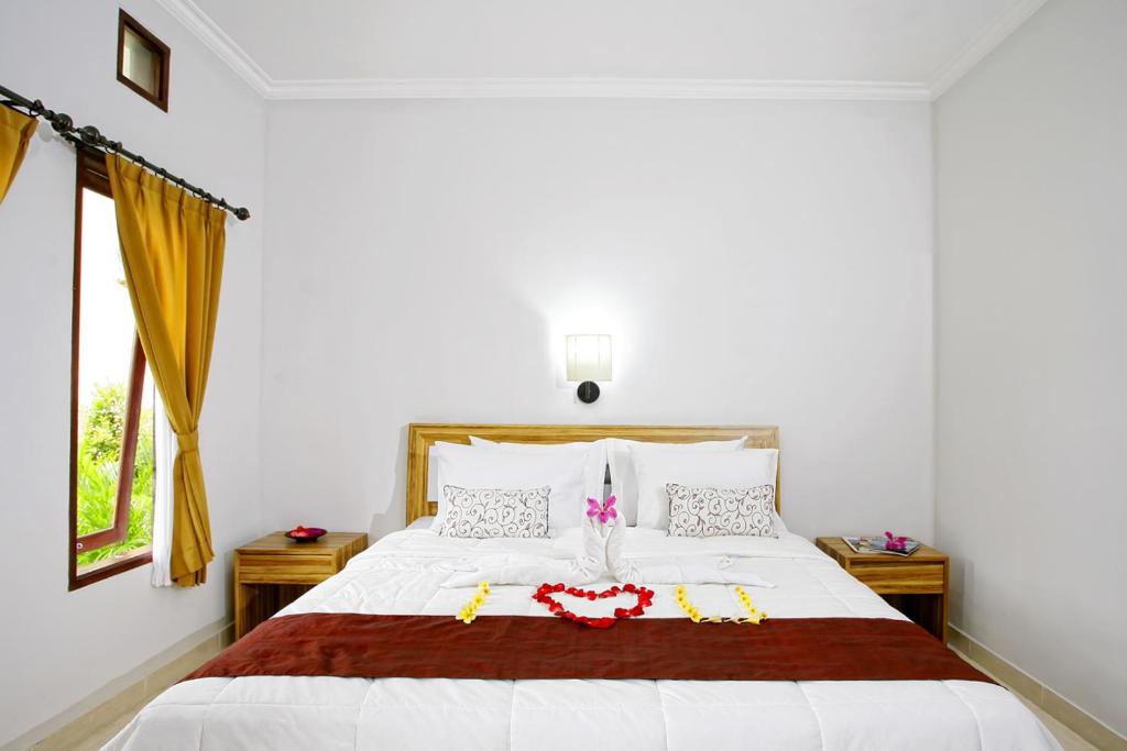 Двухместный (Двухместный номер Делюкс с 1 кроватью) гостевого дома Tanjung Sari Inn, Нуса Дуа