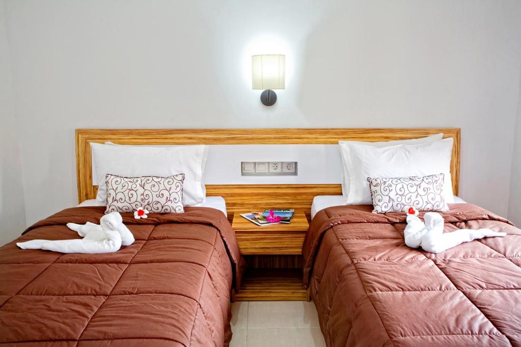 Двухместный (Двухместный номер Делюкс с 2 отдельными кроватями) гостевого дома Tanjung Sari Inn, Нуса Дуа