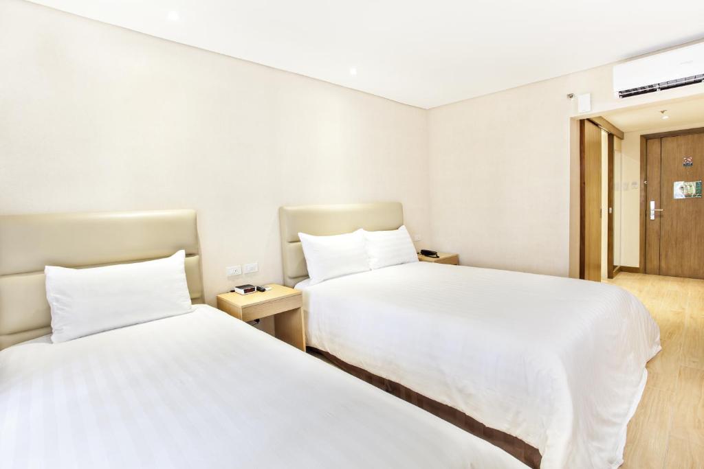 Двухместный (Двухместный номер бизнес-класса с 2 отдельными кроватями) отеля Jinjiang Inn Ortigas, Манила
