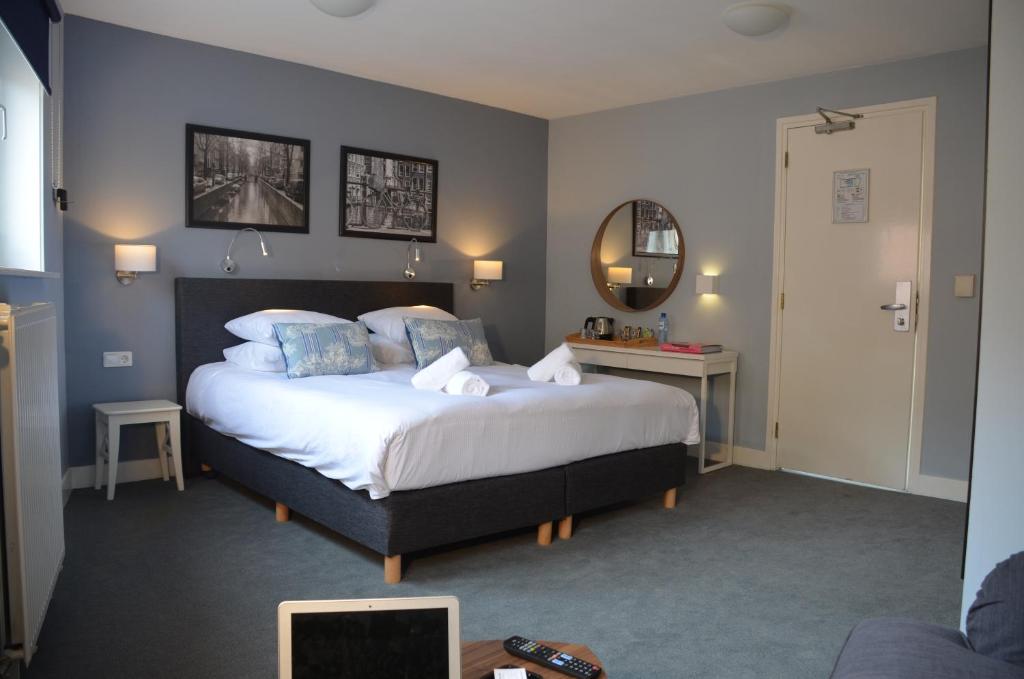 Двухместный (Двухместный номер Делюкс с 1 кроватью или 2 отдельными кроватями) отеля Frisco Inn, Амстердам