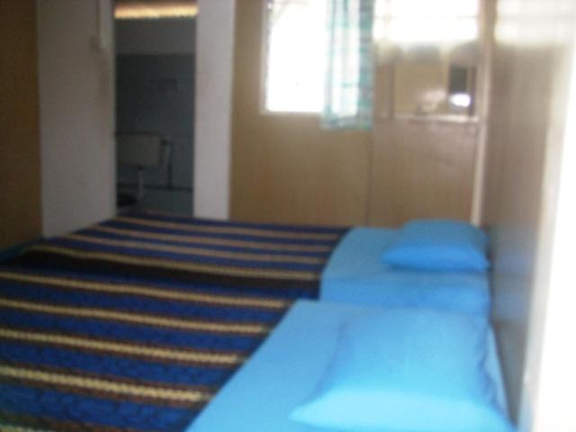 Двухместный (Двухместный номер с 1 кроватью или 2 отдельными кроватями) гостевого дома ET Budget Guest House, Пенанг