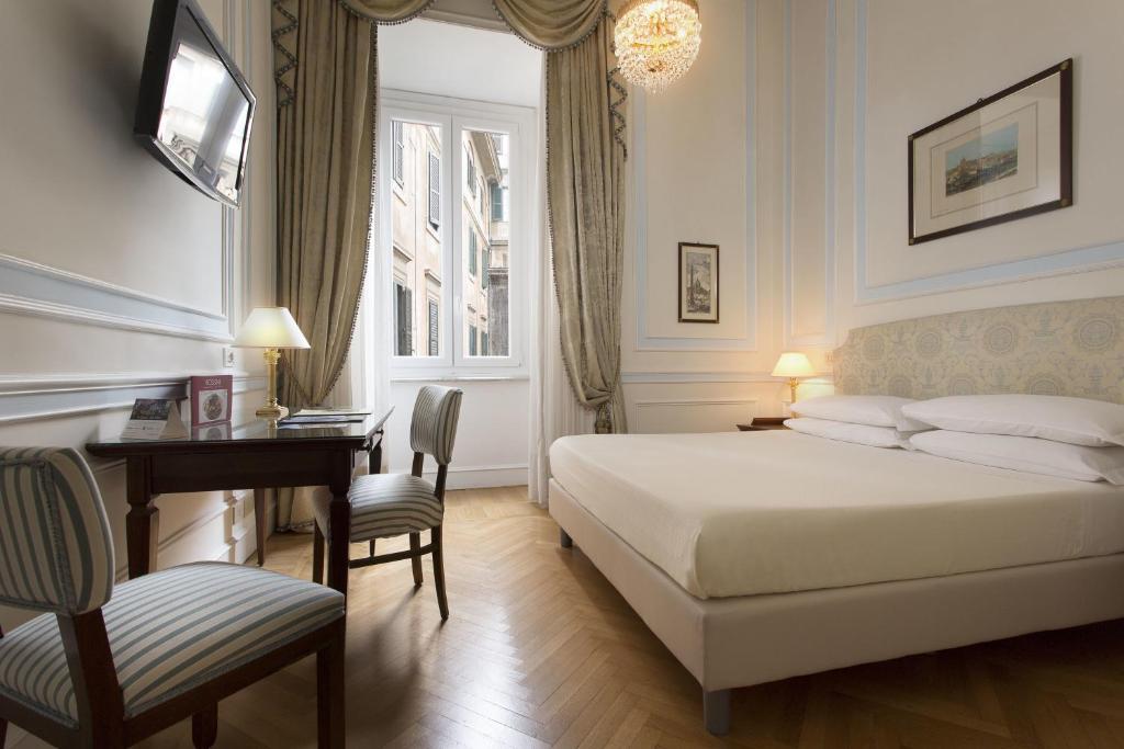 Двухместный (Небольшой двухместный номер с 1 кроватью или 2 отдельными кроватями) отеля Hotel Quirinale, Рим