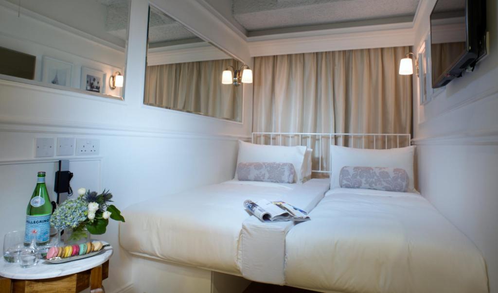Двухместный (Двухместный мини-номер с 2 отдельными кроватями) отеля Mini Hotel Causeway Bay, Гонконг (город)