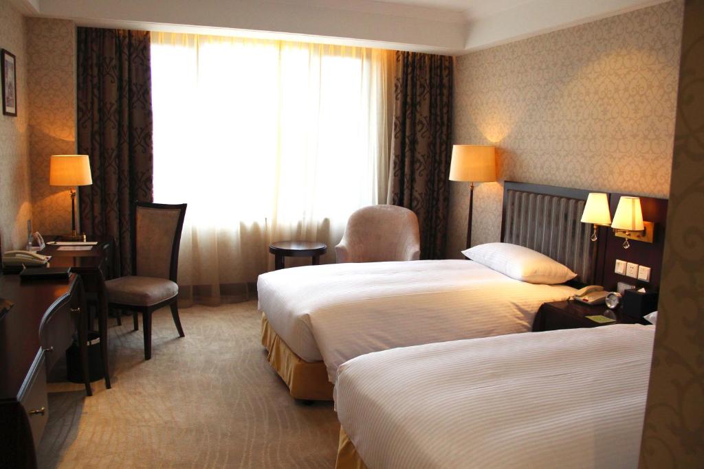 Двухместный (Двухместный номер с 1 кроватью или 2 отдельными кроватями) отеля Evergreen Laurel Hotel, Shanghai, Шанхай