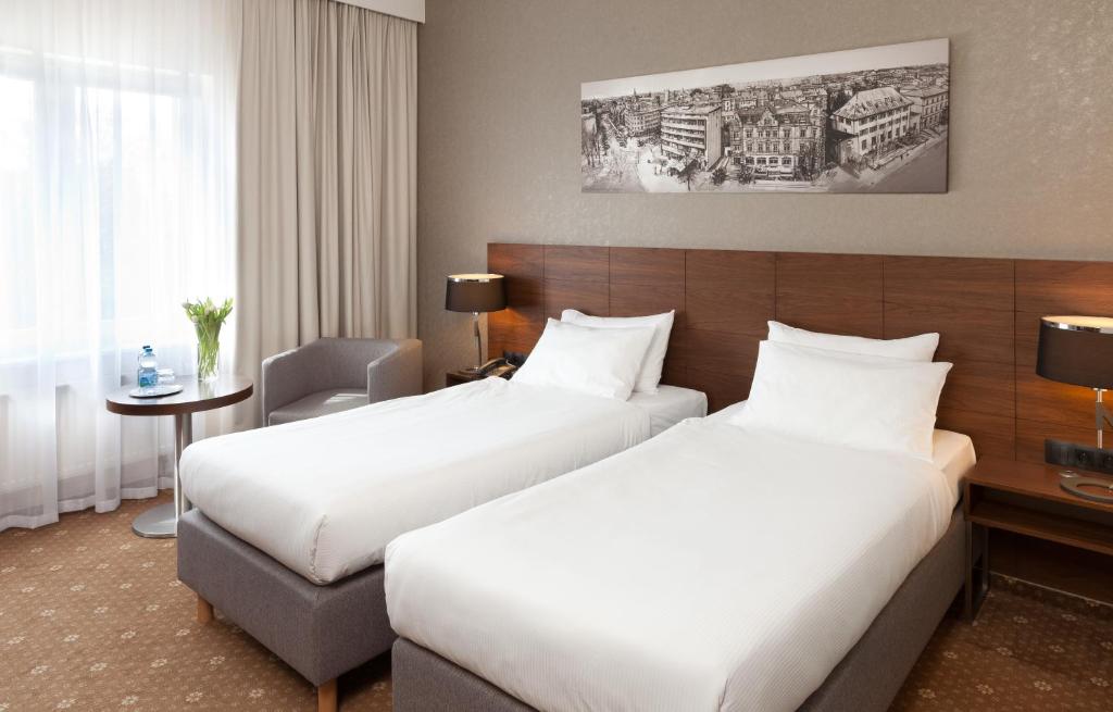 Двухместный (Двухместный номер Делюкс с 2 отдельными кроватями) отеля Warmiński Hotel & Conference, Ольштын