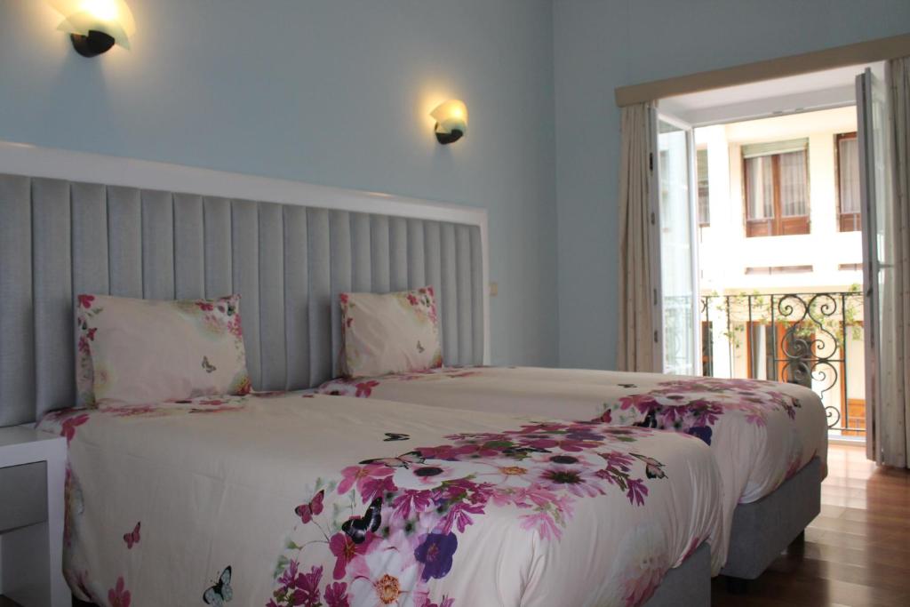 Двухместный (Улучшенный двухместный номер с 1 кроватью или 2 отдельными кроватями) гостевого дома Grande Oceano Guest House, Порту