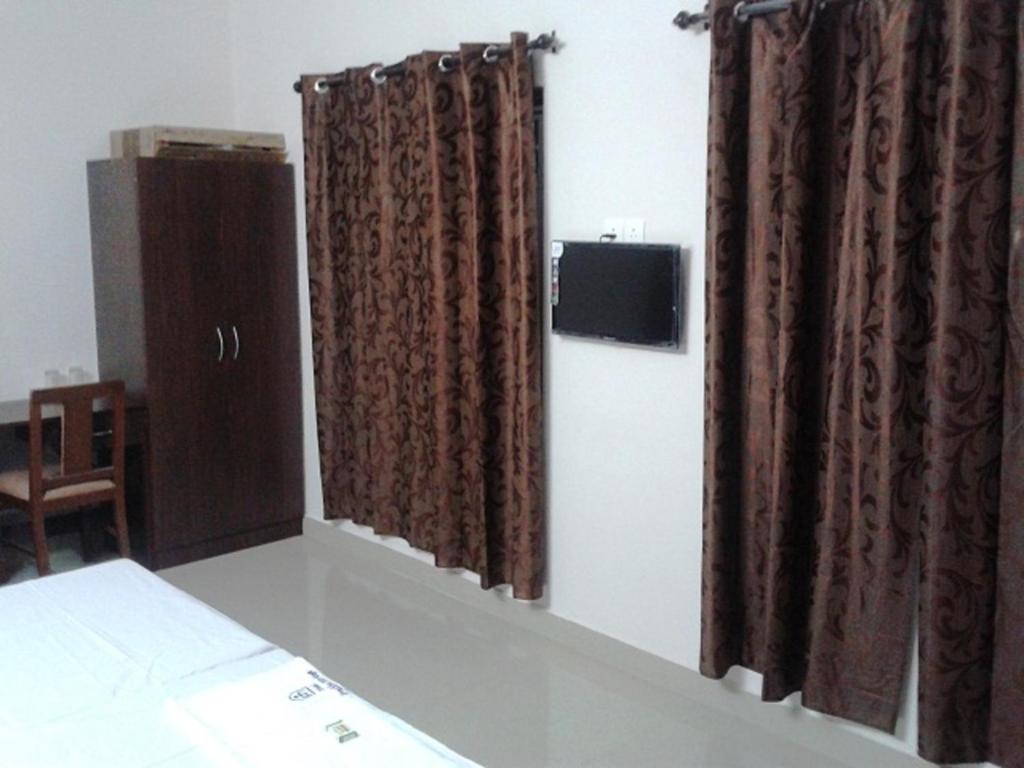 Двухместный (Двухместный номер Делюкс с 2 отдельными кроватями) отеля Hotel Prathiba Heritage, Тривандрум